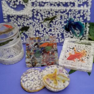 Decorative resin pieces featuring fish