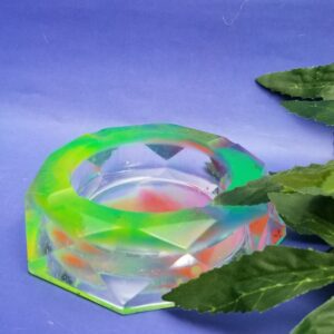 Bright glass decor piece with foliage