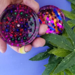 Glittery yo-yos beside green foliage
