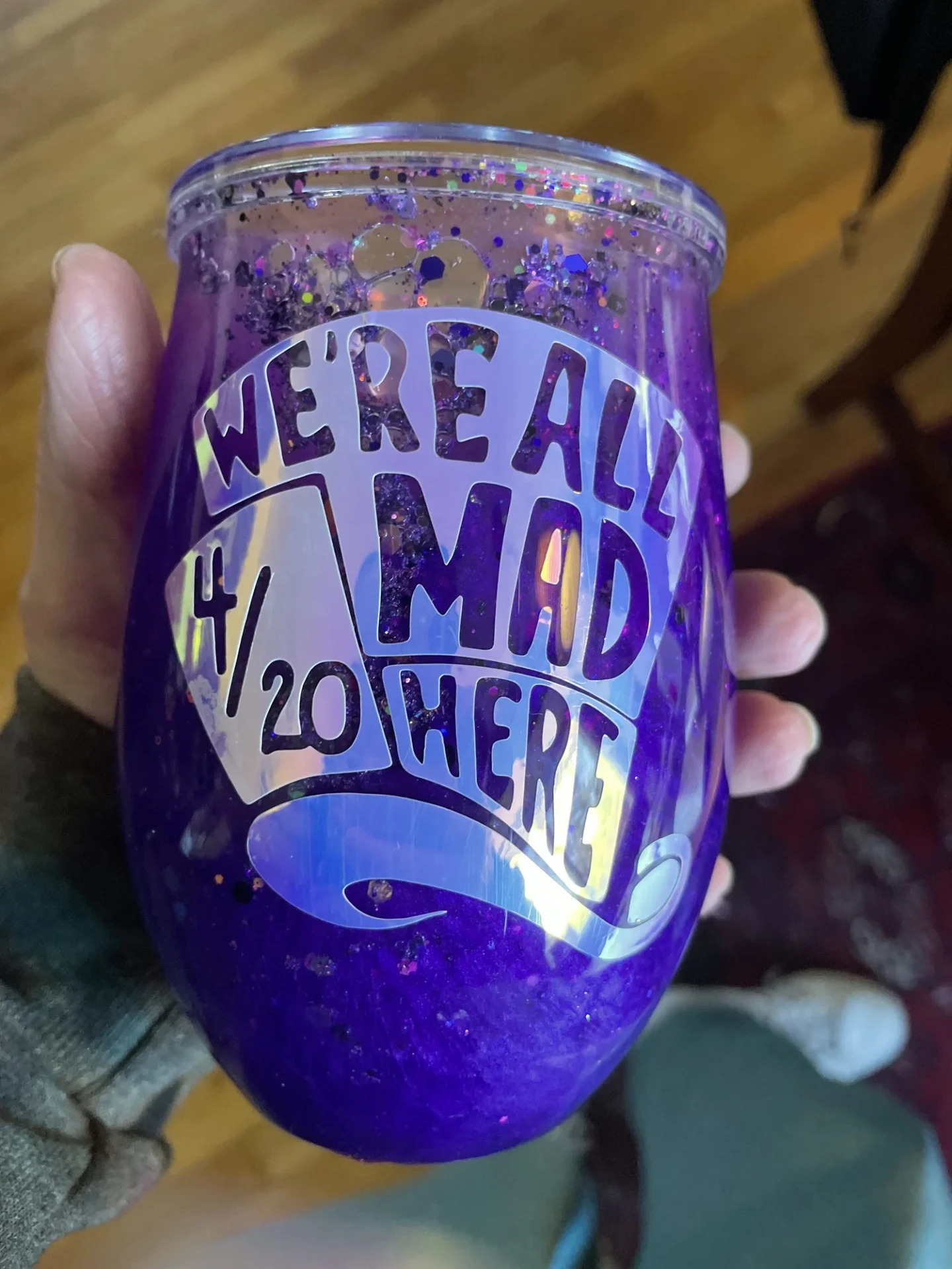 We're All Mad Here" cup design