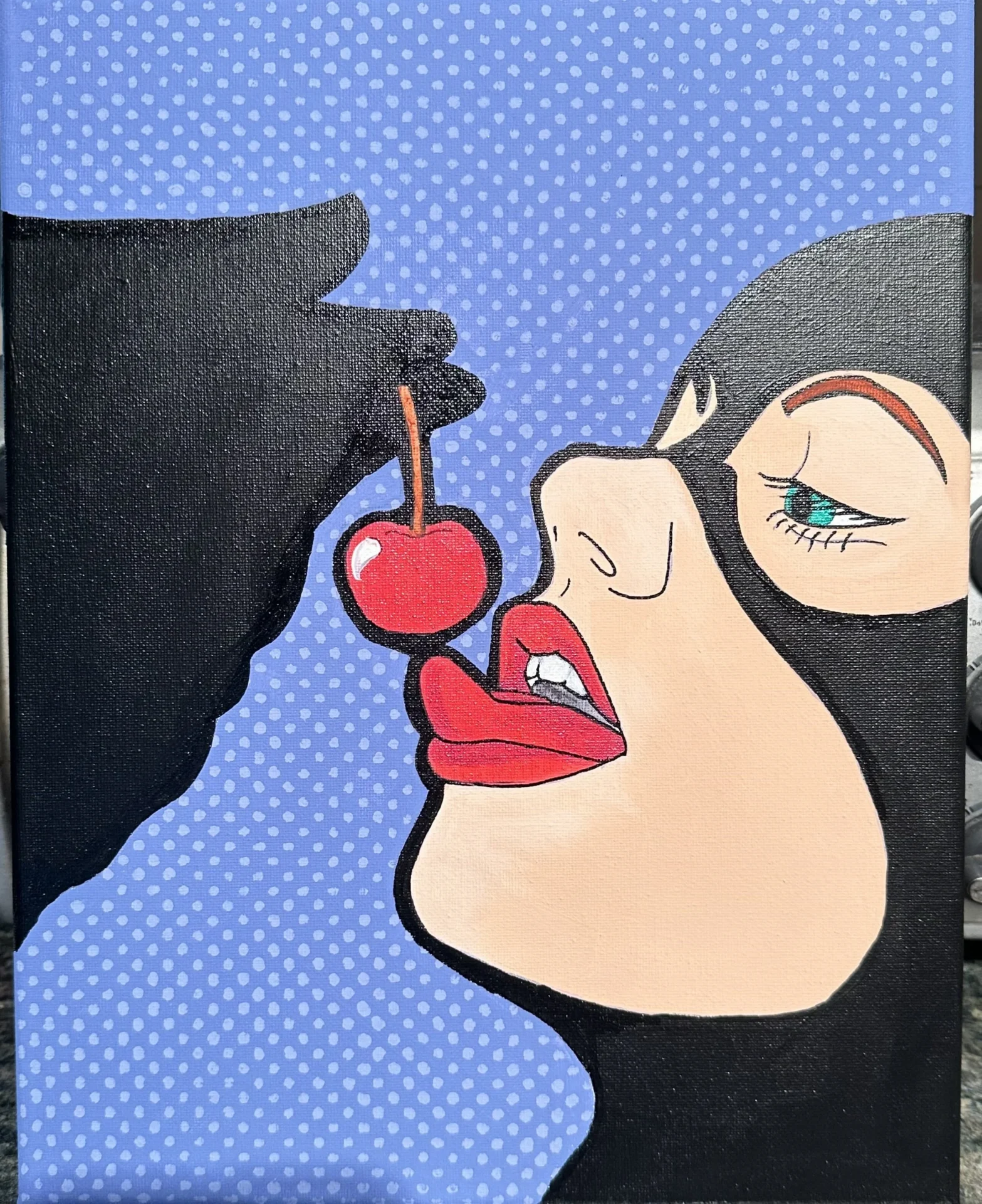 Pop art woman holding a cherry