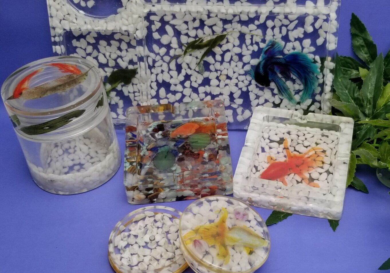 Decorative resin pieces featuring fish