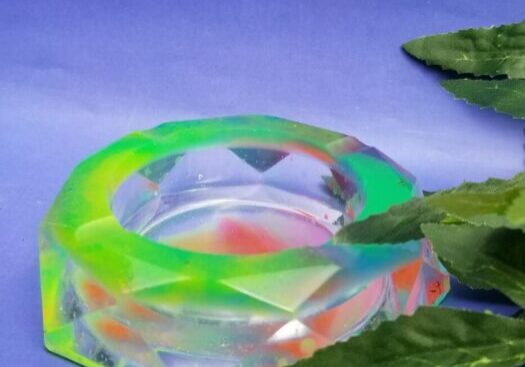 Bright glass decor piece with foliage